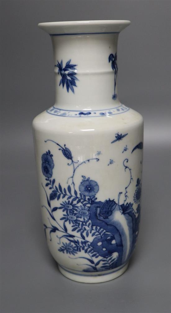 A Chinese blue and white vase, in underglaze blue decorated with butterflies, height 23cm